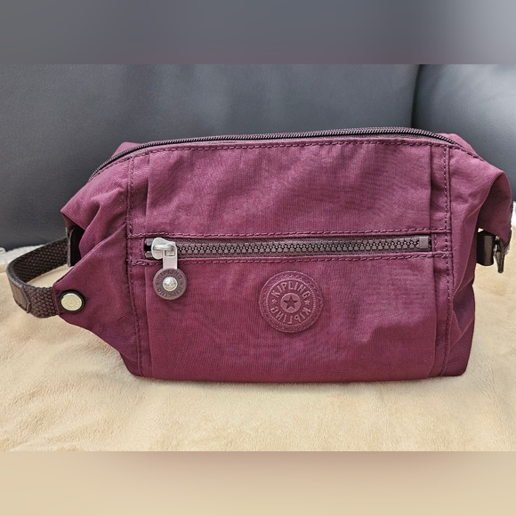 Kipling Aiden Toiletrie / Beauty / Shower Bag in the Color Dark Plum. - Picture 1 of 11